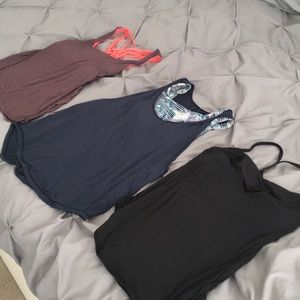 Set of THREE lululemon workout tops, size 6.